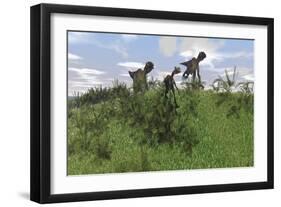 Two Utahraptors Chasing a Gigantoraptor across a Grassy Field-null-Framed Premium Giclee Print