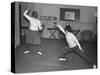 Two Waafs Fencing for Recreation During World War Ii-Robert Hunt-Stretched Canvas