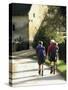 Two Walkers with Rucksacks on the Cotswold Way Footpath, Stanton Village, the Cotswolds, England-David Hughes-Stretched Canvas