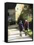 Two Walkers with Rucksacks on the Cotswold Way Footpath, Stanton Village, the Cotswolds, England-David Hughes-Framed Stretched Canvas