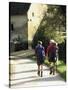 Two Walkers with Rucksacks on the Cotswold Way Footpath, Stanton Village, the Cotswolds, England-David Hughes-Stretched Canvas