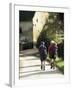 Two Walkers with Rucksacks on the Cotswold Way Footpath, Stanton Village, the Cotswolds, England-David Hughes-Framed Photographic Print