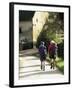 Two Walkers with Rucksacks on the Cotswold Way Footpath, Stanton Village, the Cotswolds, England-David Hughes-Framed Photographic Print