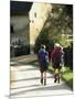 Two Walkers with Rucksacks on the Cotswold Way Footpath, Stanton Village, the Cotswolds, England-David Hughes-Mounted Photographic Print