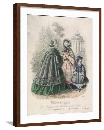 Two Women and a Child Wearing the Latest Fashions in a Garden Setting, 1860--Framed Giclee Print