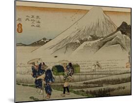Two Women and a Servant Walk Through Rice Fields, with Mount Fuji in the Background-Utagawa Hiroshige-Mounted Art Print