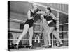 Two Women Box in a Ring, with a Referee Present-null-Stretched Canvas