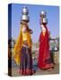Two Women by a Well Carrying Water Pots, Barmer, Rajasthan, India-Bruno Morandi-Stretched Canvas