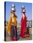 Two Women by a Well Carrying Water Pots, Barmer, Rajasthan, India-Bruno Morandi-Stretched Canvas