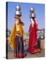 Two Women by a Well Carrying Water Pots, Barmer, Rajasthan, India-Bruno Morandi-Stretched Canvas