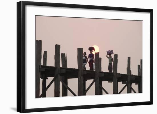 Two Women Carrying Bags on their Heads and Small Girl Crossing U Bein Teak Bridge-Stephen Studd-Framed Photographic Print