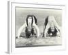 Two Women Doing Backbends on the Beach-null-Framed Photo