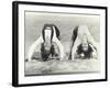 Two Women Doing Backbends on the Beach-null-Framed Photo