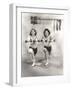 Two Women Exercising with Dumbbells at Gym-null-Framed Photo