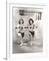 Two Women Exercising with Dumbbells at Gym-null-Framed Photo