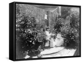 Two Women in their Garden in Cuba Photograph - Cuba-Lantern Press-Framed Stretched Canvas