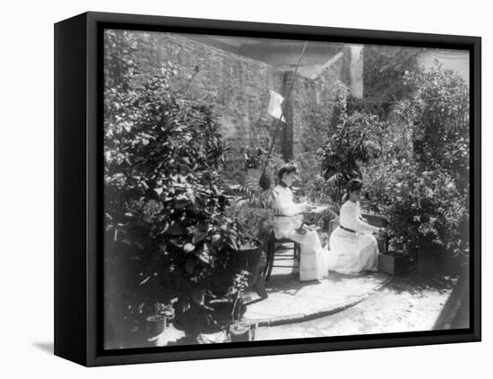 Two Women in their Garden in Cuba Photograph - Cuba-Lantern Press-Framed Stretched Canvas