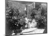 Two Women in their Garden in Cuba Photograph - Cuba-Lantern Press-Mounted Art Print