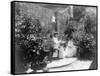 Two Women in their Garden in Cuba Photograph - Cuba-Lantern Press-Framed Stretched Canvas