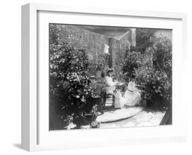 Two Women in their Garden in Cuba Photograph - Cuba-Lantern Press-Framed Art Print