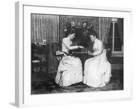 Two Women Playing Chess-null-Framed Photographic Print