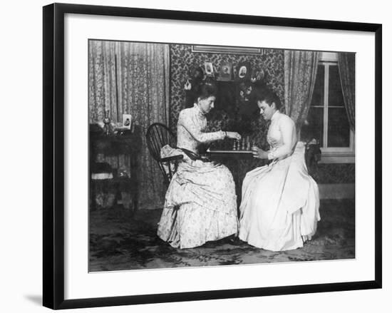 Two Women Playing Chess-null-Framed Photographic Print