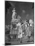 Two Women Standing in Front of a Statue of the Empress Josephine on the Island of Martinique-null-Mounted Photographic Print