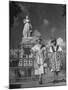 Two Women Standing in Front of a Statue of the Empress Josephine on the Island of Martinique-null-Mounted Photographic Print