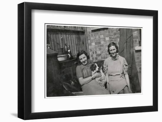 Two Women with a Dog in a Back Garden-null-Framed Photographic Print