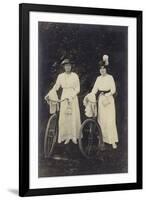Two Women with Bicycles, Carrying Purses-null-Framed Premium Photographic Print