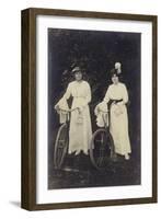 Two Women with Bicycles, Carrying Purses-null-Framed Photographic Print