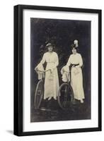 Two Women with Bicycles, Carrying Purses-null-Framed Photographic Print