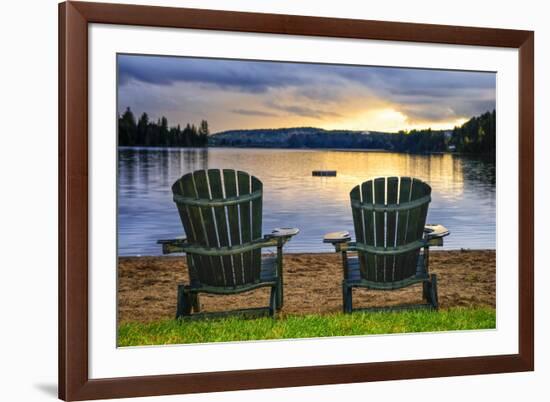 Two Wooden Chairs on Beach of Relaxing Lake at Sunset. Algonquin Provincial Park, Canada.-elenathewise-Framed Photographic Print