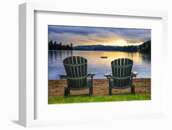 Two Wooden Chairs on Beach of Relaxing Lake at Sunset. Algonquin Provincial Park, Canada.-elenathewise-Framed Photographic Print