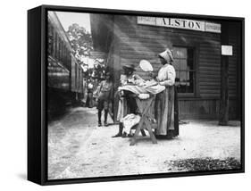 Two Young Black Women Selling Cakes at Alston Railroad Station, Next to a Train That Has Stopped-Wallace G^ Levison-Framed Stretched Canvas