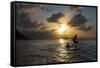 Two Young Boys Attempt to Surf on Praia Da Conceicao Beach at Sunset-Alex Saberi-Framed Stretched Canvas