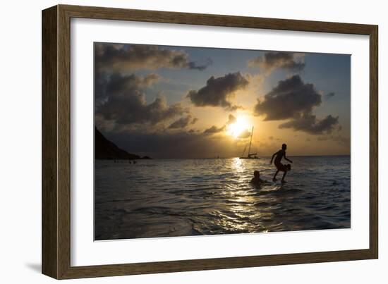 Two Young Boys Attempt to Surf on Praia Da Conceicao Beach at Sunset-Alex Saberi-Framed Photographic Print