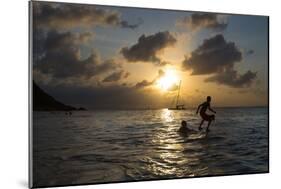 Two Young Boys Attempt to Surf on Praia Da Conceicao Beach at Sunset-Alex Saberi-Mounted Photographic Print