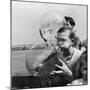 Two Young Boys Blowing Large Transparent Bubbles with a Blow-Straw Dipped in a Soft Plastic-Alfred Eisenstaedt-Mounted Photographic Print