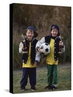 Two Young Brothers Posing with their Soccer Trophies-Paul Sutton-Stretched Canvas