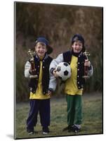 Two Young Brothers Posing with their Soccer Trophies-Paul Sutton-Mounted Photographic Print