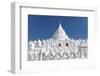 Two young Buddhist monks run and jump across the white walls of Hsinbyume Pagoda, Mingun, Mandalay,-Tim Mannakee-Framed Photographic Print