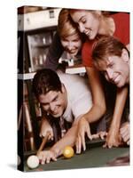 Two Young Couples Playing Pool-null-Stretched Canvas