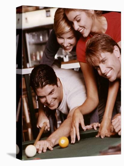 Two Young Couples Playing Pool-null-Stretched Canvas