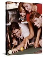 Two Young Couples Playing Pool-null-Stretched Canvas