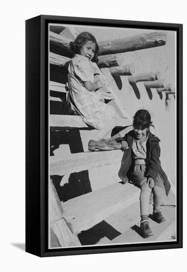 Two Young Girls Sitting On Steps. At San Ildefonso Pueblo New Mexico 1942." 1942-Ansel Adams-Framed Stretched Canvas