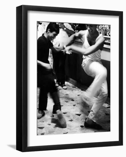 Two Young Italian Men Dancing to Music from a Jukebox in a Bar-Paul Schutzer-Framed Photographic Print