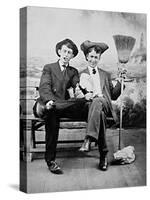 Two Young Men on a Bench with a Broom, Ca. 1900-null-Stretched Canvas