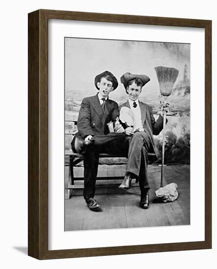 Two Young Men on a Bench with a Broom, Ca. 1900-null-Framed Photographic Print