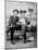 Two Young Men on a Bench with a Broom, Ca. 1900-null-Mounted Photographic Print